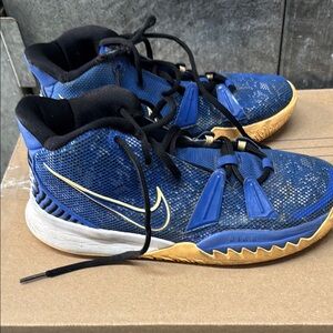 Nike Blue and Gold Sneakers with Mesh Upper and Athletic Design